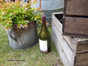 Bottle with wooden crates at Cloudy Bay Crab Shack with Skye Gyngell