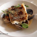 Fillet of hake with clams, cod cheek, mushroom and shallots at Catch and Cook with Simon Hulstone in Torquay