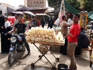 Man selling loofah, Edfu, Egypt