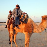 Qin Xie riding a camel, Tunisia