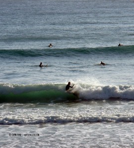 Surfers in Lagos, Portugal