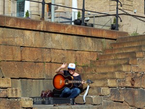 Man with guitar in Gothenburg, West Sweden